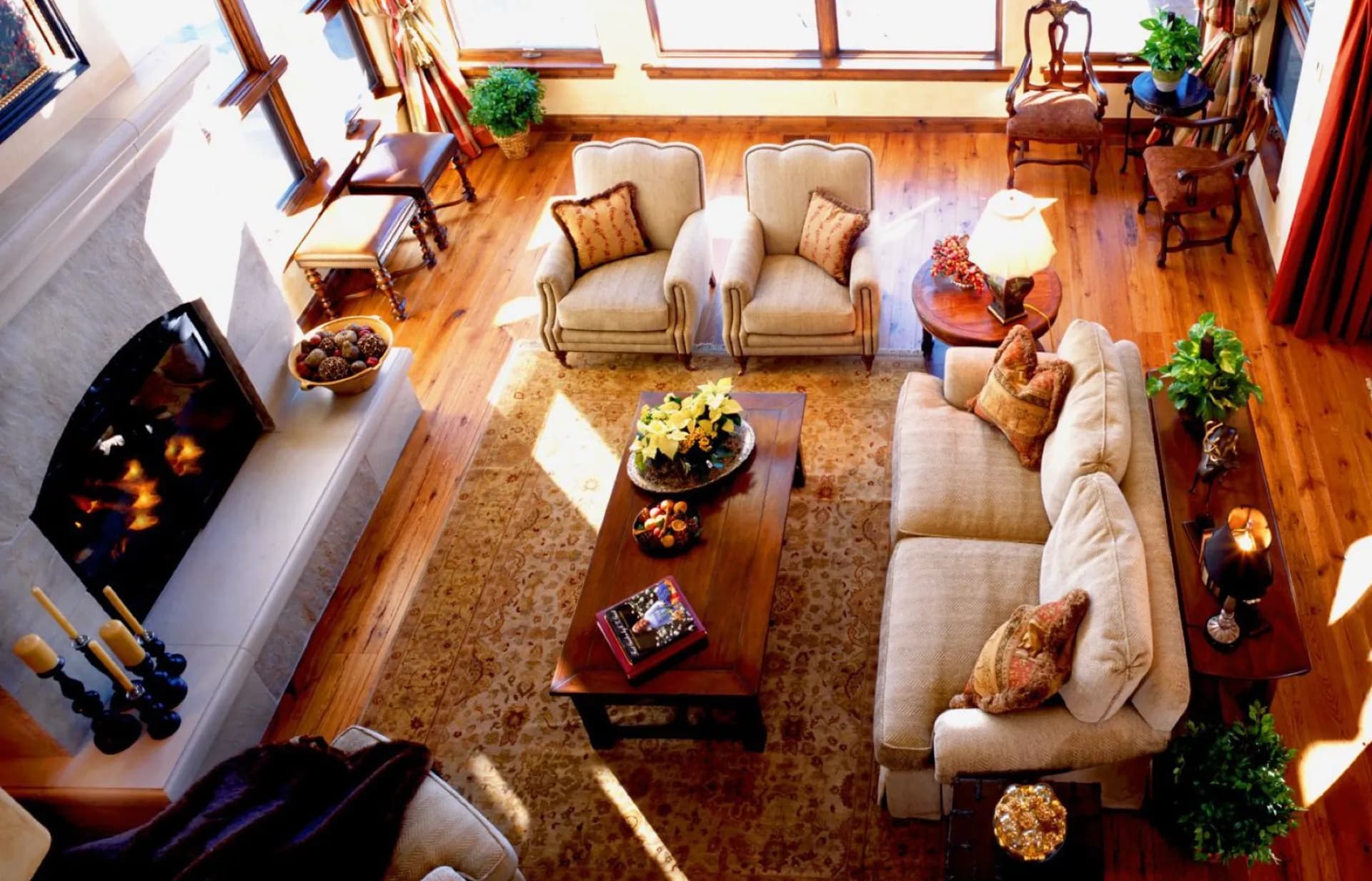 Warm remodeled living room with hardwood floors and fireplace